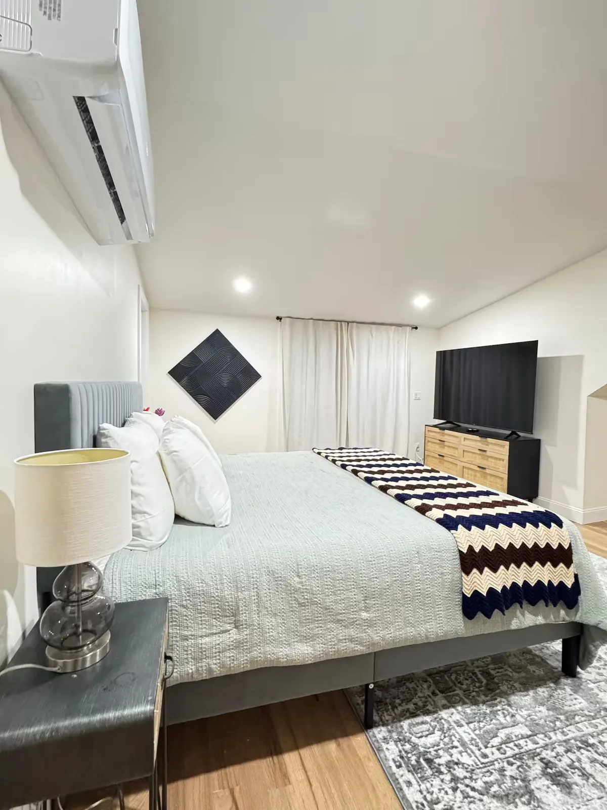Bedroom with upholstered headboard
