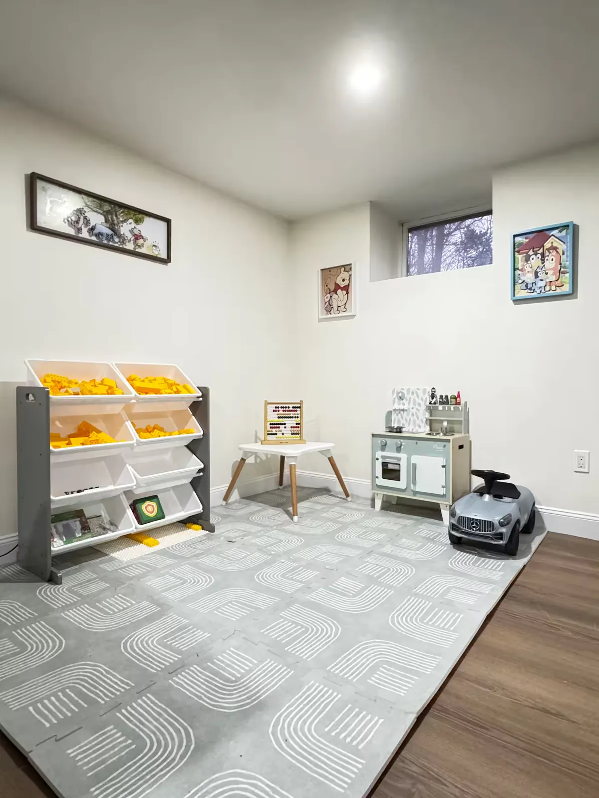 Indoor kids' playroom with play kitchen