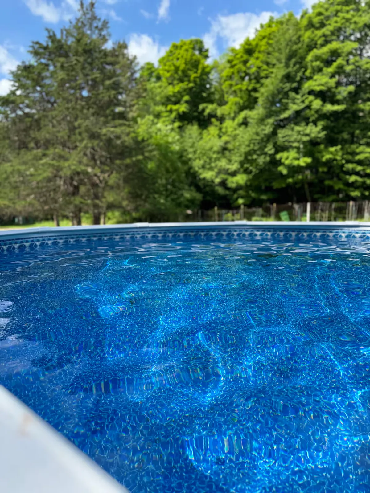 Summer pool water at Wildfield House